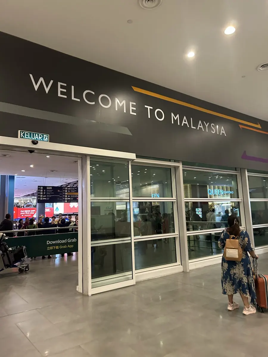 Airport arrival hall, Welcome to Malaysia